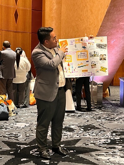 BE Camp participant sharing Dream Board